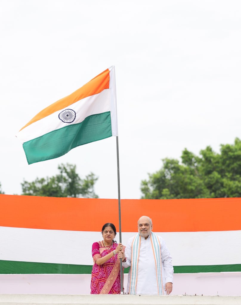 Union Home Minister Amit Shah hoists Tricolour at his residence under ‘Har Ghar Tiranga’ campaign