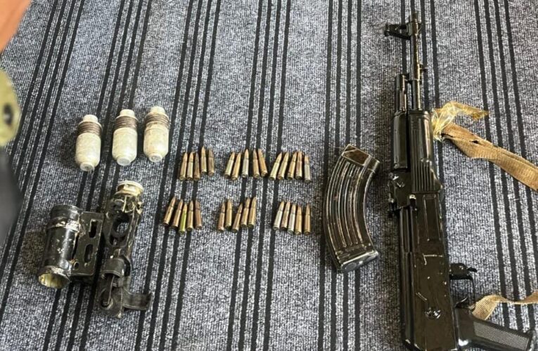 Security forces recover AK 47 and grenades during search operation in Sopore
